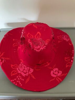 Red Hat with Floral Sequin Accents on it.